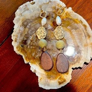 Express long  earrings.